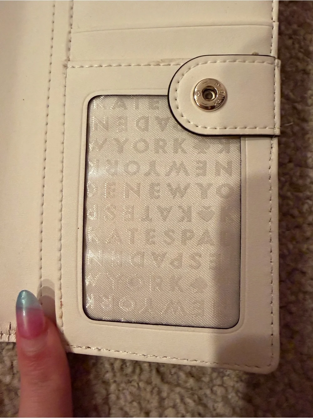 kate spade gray card holder with gold logo